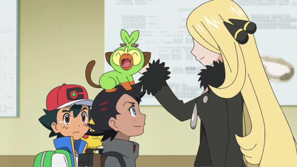 Episodio 83 Viajes Pokémon Cintia acaricia al Grookey de Goh